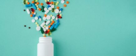 What medications or substances are used to treat genital warts?